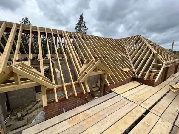 Large timber cut roof structure under construction
